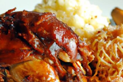 Tender Slow-Cooked Pulled Chicken in Tangy BBQ Sauce
